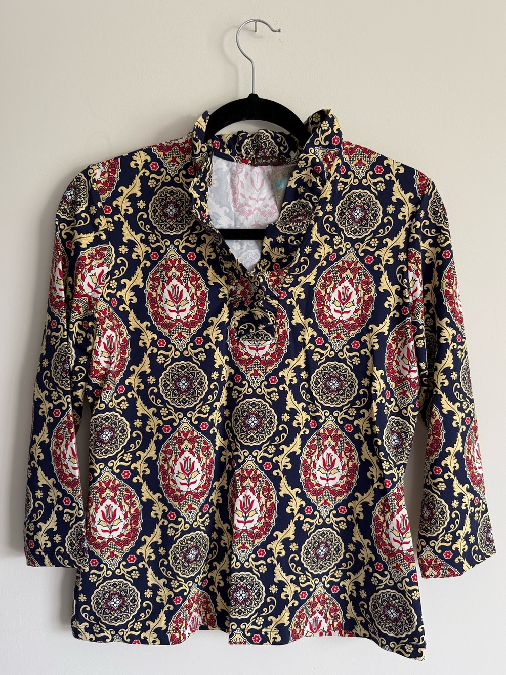 NWT J. McLaughlin top with ruffled collar, in classic print and elastic fabric